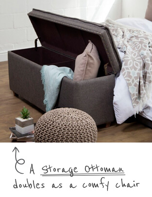 an open grey upholstered storage ottoman